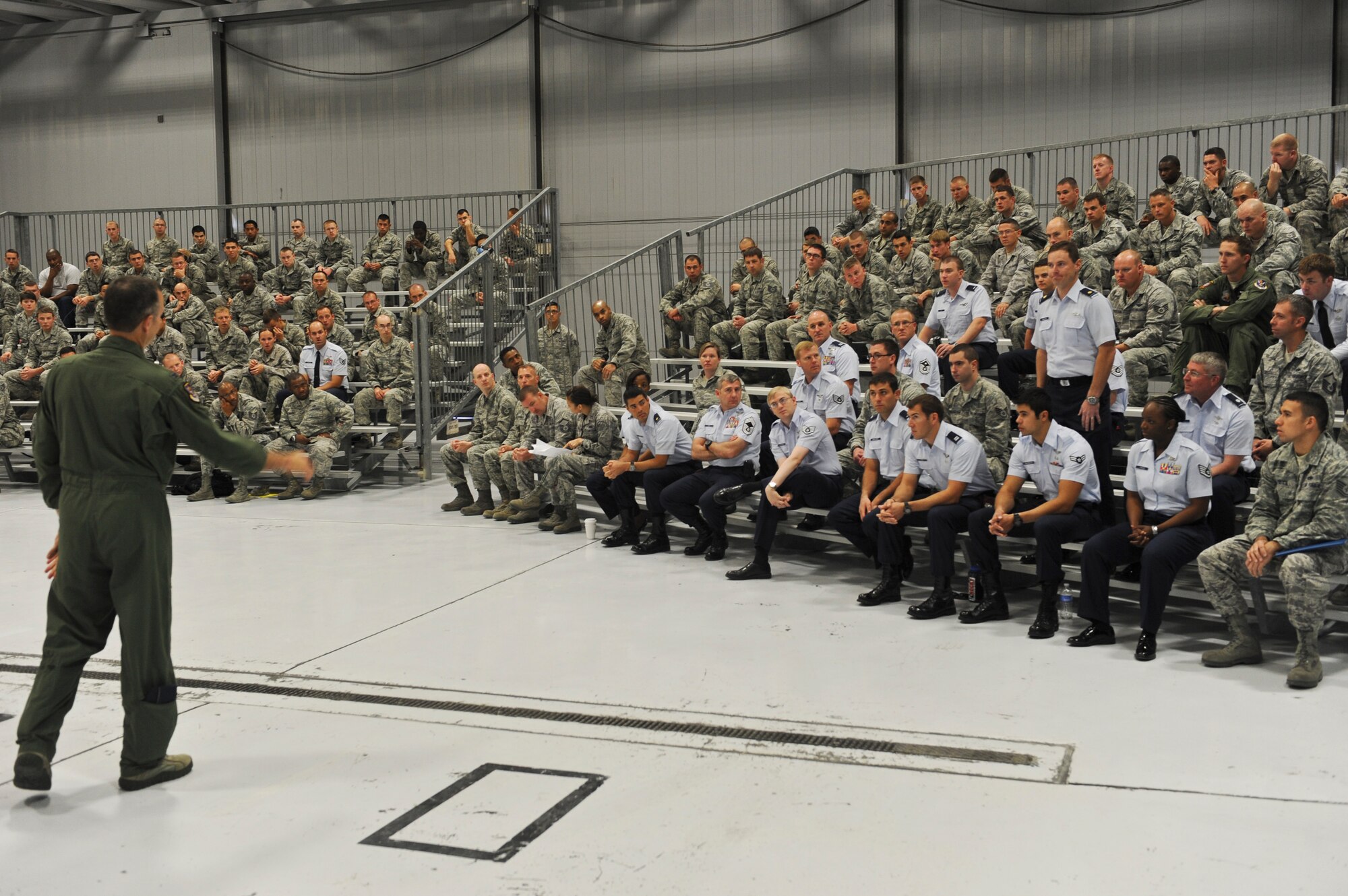 U.S. Air Force Col. Billy Thompson, 23d Wing commander, speaks to Airmen assigned to the 823d Maintenance Squadron during a commander’s call at Nellis Air Force Base, Nev., May 7, 2012. Thompson spoke about the 823d MXS’ contributions to the wing’s recent accomplishment in winning the Clements McMullen Memorial Daedalian Weapons System Maintenance Trophy. (U.S. Air Force photo by Staff Sgt. Ciara Wymbs/Released)