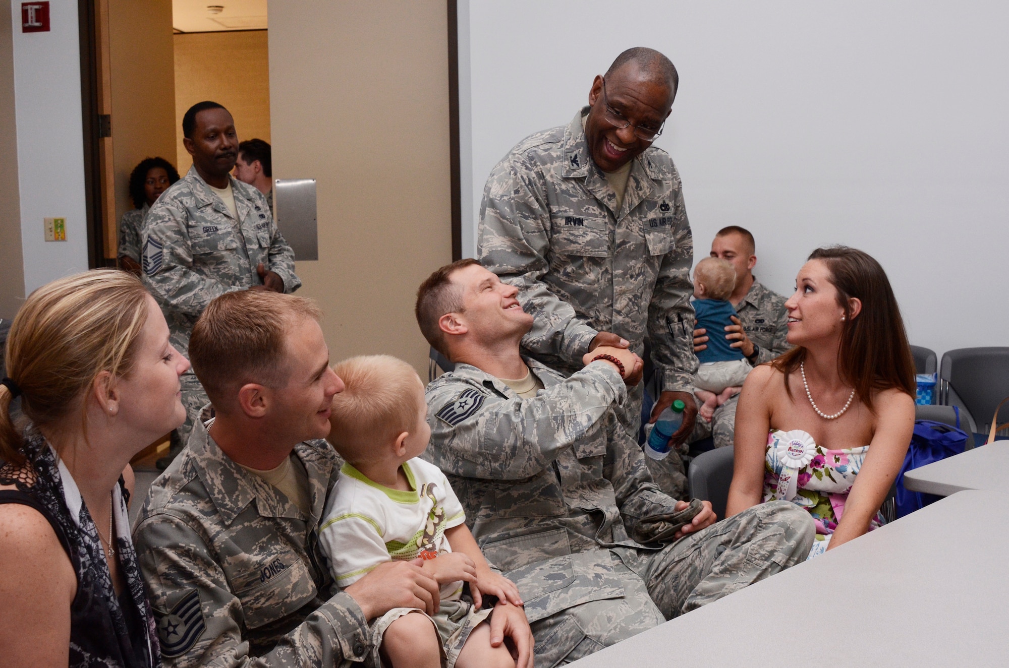 Col. Marshall S. Irvin Jr., 94th Mission Support Group, commander welcomes home Reservists upon their return from a deployment to the Middle East at a reception in their honor here May 17. (U.S. Air Force photo/Don Peek)