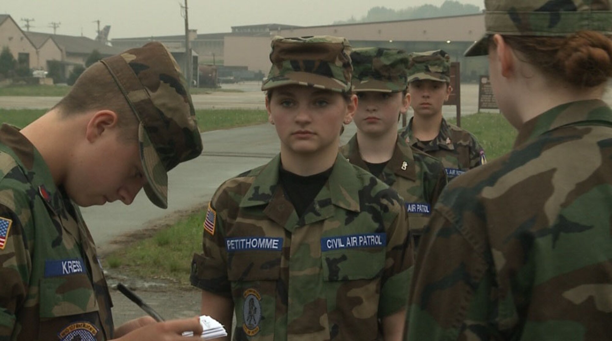 Cadets with the 'Mad Mustangs' Civil Air Patrol stand in formation for an open ranks uniform inspection May 14, 2012, at Osan Air Base, Republic of Korea. Cadets practice traditional military events each week to retain their skills. (U.S. Air Force photo/Staff Sgt. Gena Armstrong)