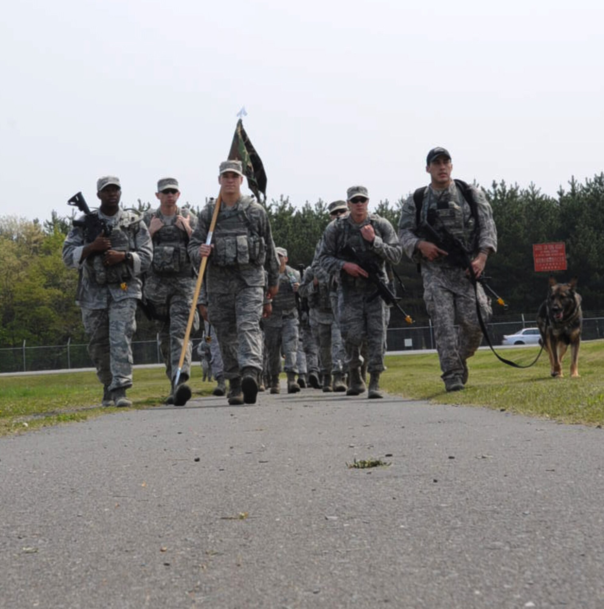 Members of the 35th Security Forces Squadron march around the base perimeter during a ruck march event in support of National Police Week at Misawa Air Base, Japan, May 18, 2012. The march lasted approximately four hours. (U.S. Air Force photo by Airman Kenna Jackson/Released)