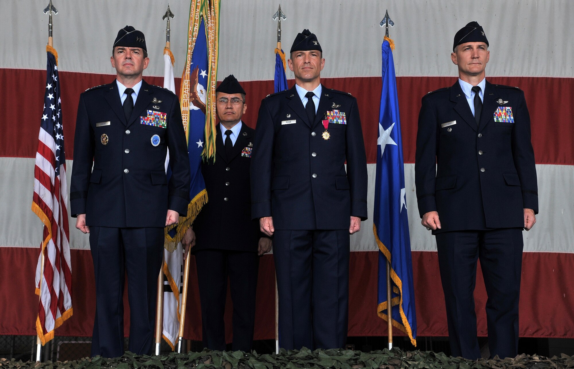 Lt. Gen Jan-Marc Jouas, 7th Air Force commander, Col. Scott Pleus, former 8th Fighter Wing commander, and Col. John W. Pearse, 8th FW commander stand at attention during a change of command ceremony on Kunsan Air Base, Republic of Korea, May 18, 2012.  The ceremony marks the official acceptance of Pearse as the Wolf Pack’s newest commander. (U.S. Air Force photo/Staff Sgt. Rasheen Douglas)