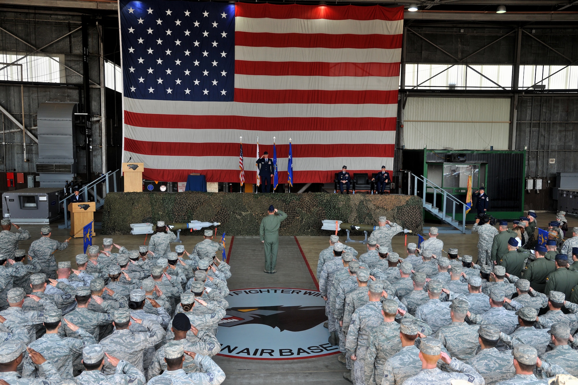 Col. John W. Pearse receives his first salute from the Wolf Pack after taking command of the 8th Fighter Wing on Kunsan Air Base, Republic of Korea, May 18, 2012.  Pearse is the 52nd commander to take the title of “Wolf.” (U.S. Air Force photo/Staff Sgt. Michael Schocker)