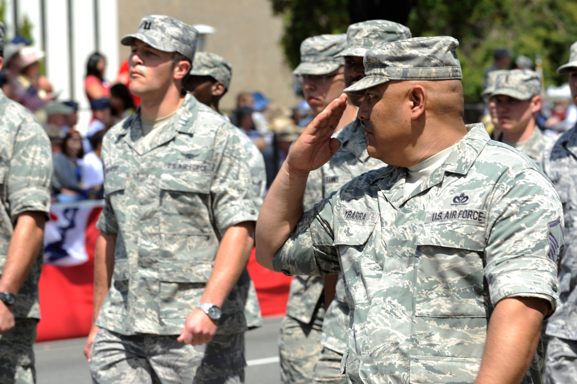 TORRANCE, Calif. -- Master Sgt. Yogi Ybarra, 30th Civil Engineer Squadron water and fuel systems maintenance chief, salutes the distinguished visitors during the 53rd Annual Armed Forces Day Parade here Saturday, May 19, 2012. Of the distinguished visitors, the Secretary of the Air Force was honored as the Grand Marshal during the days events. (U.S. Air Force photo/Staff Sgt. Levi Riendeau)




 