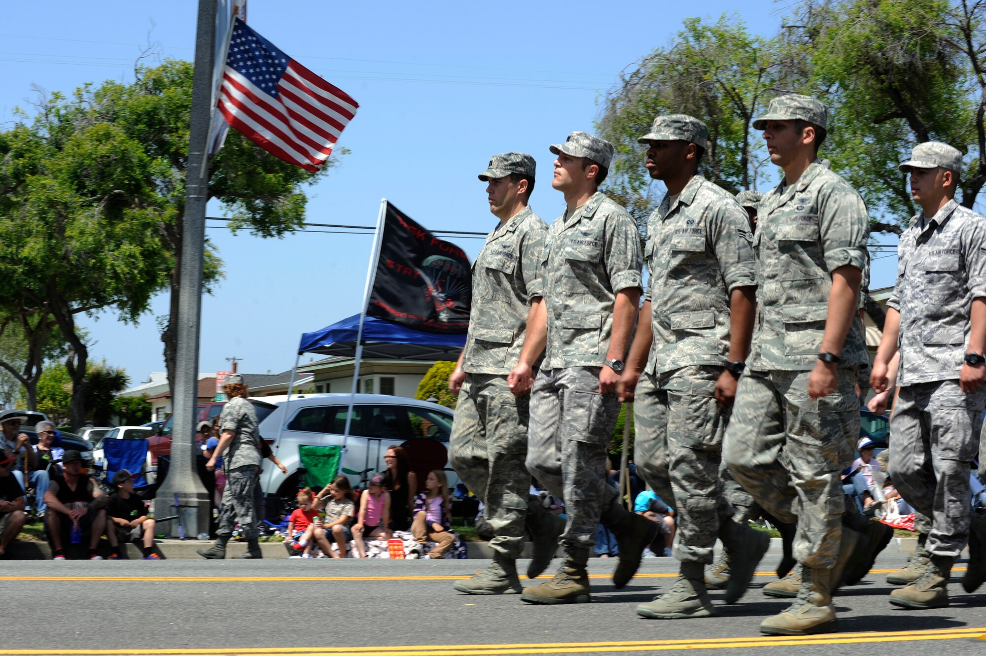 TORRANCE, Calif. -- Team V Airmen march during the 53rd Annual Armed Forces Day Parade here Saturday, May 19, 2012. Approximately 325 Airmen from Vandenberg Air Force Base, Los Angeles AFB and Edwards AFB marched in the parade of more than 100,000 onlookers. (U.S. Air Force photo/Staff Sgt. Levi Riendeau)

 