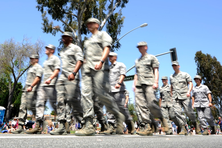 TORRANCE, Calif. -- Team V Airmen march during the 53rd Annual Armed Forces Day Parade here Saturday, May 19, 2012. Approximately 325 Airmen from Vandenberg Air Force Base, Los Angeles AFB and Edwards AFB marched in the parade of more than 100,000 onlookers. (U.S. Air Force photo/Staff Sgt. Andrew Satran) 