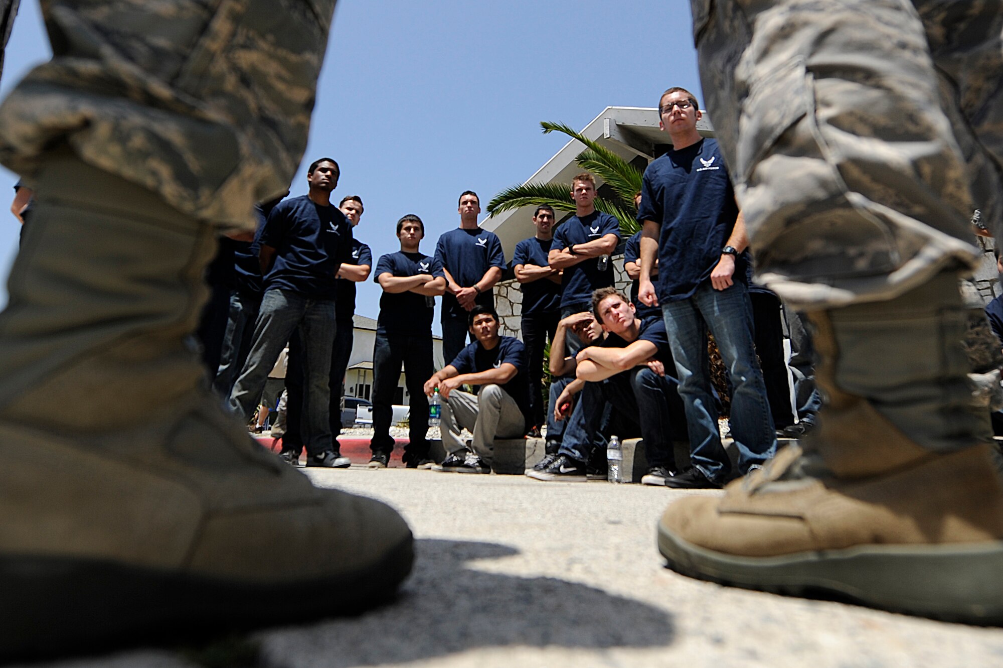 TORRANCE, Calif. -- Team V Airmen mentor Air Force delayed enlistees before the parade begins during the 53rd Annual Armed Forces Day here Saturday, May 19, 2012. More than 150 Soldiers, Sailors, Airmen, Marines and Coast Guardsmen attended the ceremony at the military exhibits area in the Del Amo parking lot. (U.S. Air Force photo/Staff Sgt. Andrew Satran) 
