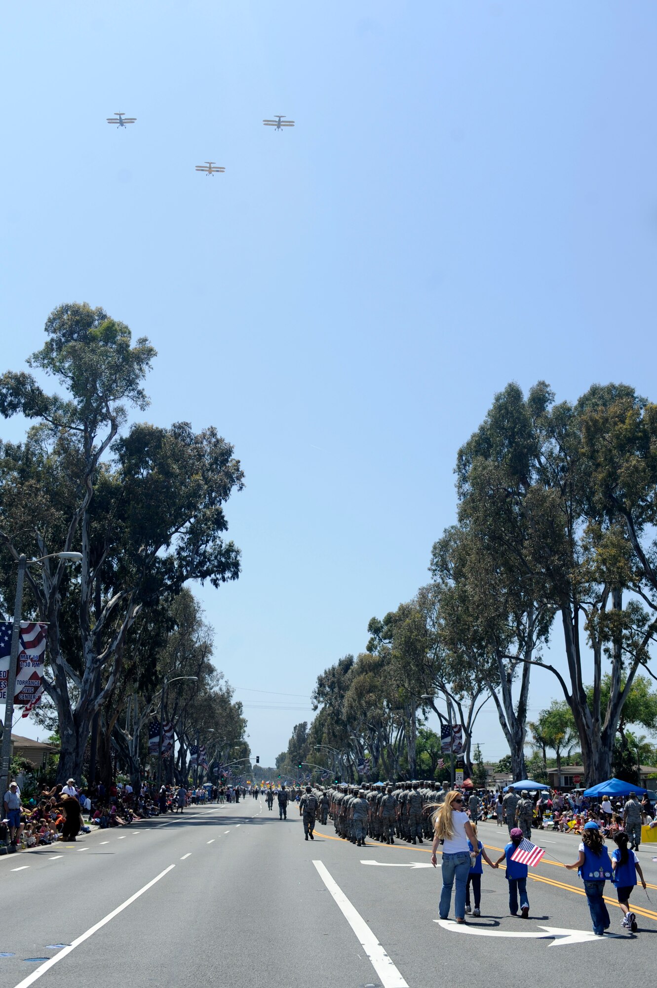 TORRANCE, Calif. -- Team V Airmen march during the 53rd Annual Armed Forces Day Parade here Saturday, May 19, 2012. Approximately 325 Airmen from Vandenberg Air Force Base, Los Angeles AFB and Edwards AFB marched in the parade of more than 100,000 onlookers. (U.S. Air Force photo/Staff Sgt. Andrew Satran) 

 
