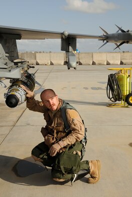 1st Lieutenant Andrew Lehman, a fighter pilot assigned to the 157th Expeditionary Fighter Squadron at Kandahar Airfield, Afghanistan, prepares to fly his first combat sortie April 20, 2012. Lehman is deployed from the 157th FS at McEntire Joint National Guard Base, S.C., in support of Operation Enduring Freedom. Swamp Fox F-16’s, pilots, and support personnel began their Air Expeditionary Force deployment early April to take over flying missions for the air tasking order and provide close air support for troops on the ground in Afghanistan. (U.S. Air Force photo/TSgt. Caycee Cook)
