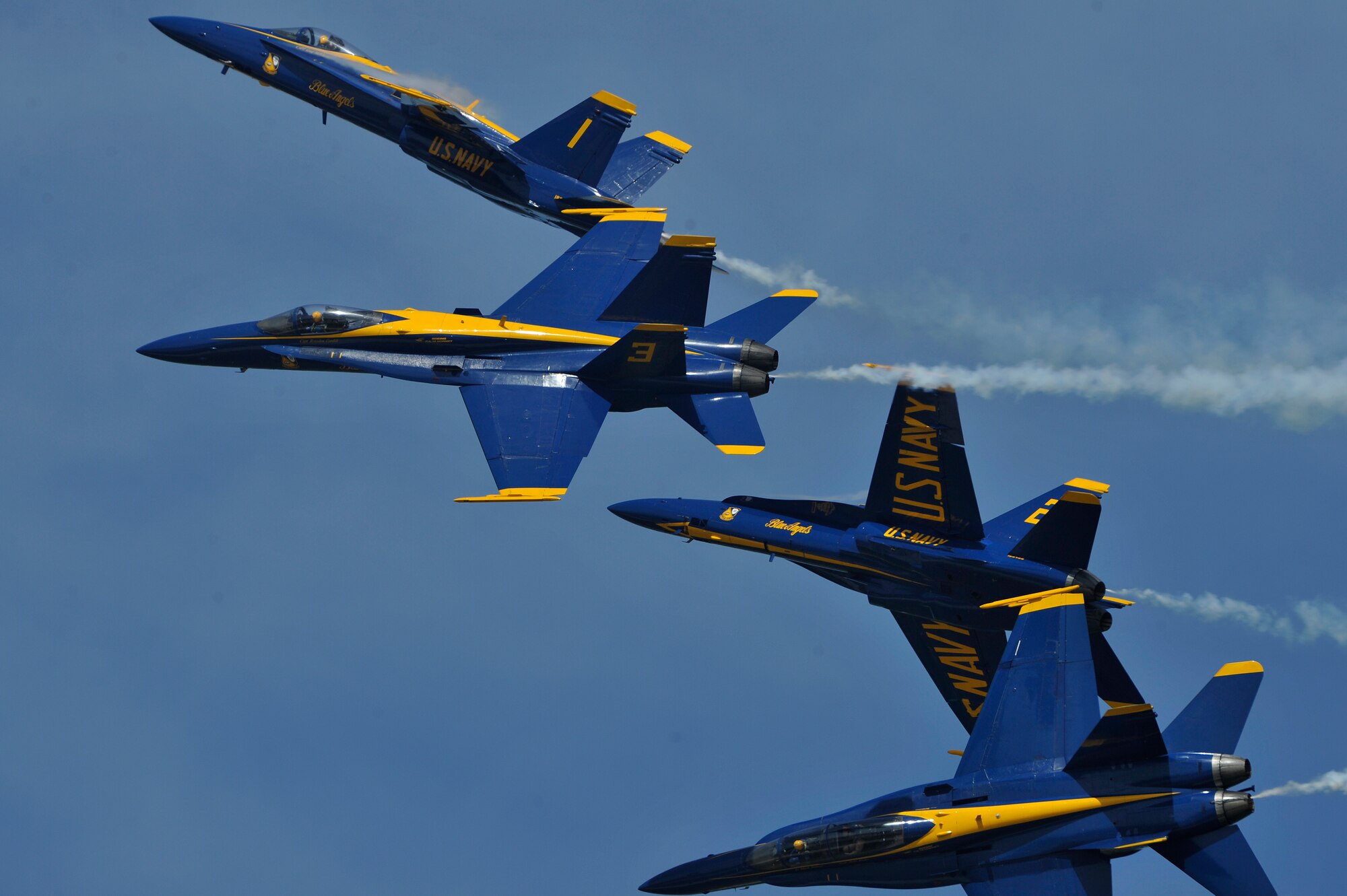 The United States Navy Blue Angels demonstration team performs during the Joint Service Open House, May 18, 2012, at Joint Base Andrews, Md. This year's Joint Service Open House celebrates the Centennial of Marine Corps Aviation. JSOH affords the public an opportunity to meet the men and women of the Armed Forces while viewing over 100 static displays and 19 aerial demonstration teams. (U.S. Air Force photo by Senior Airman Perry Aston)