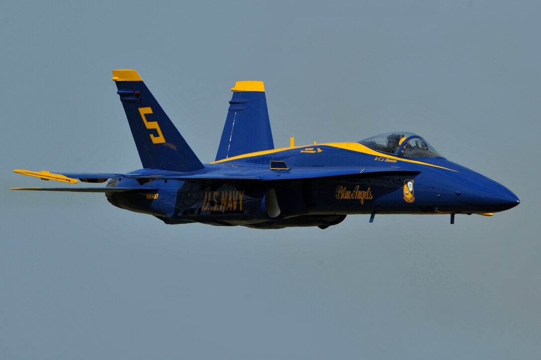 The United States Navy Blue Angels demonstration team performs during the Joint Service Open House, May 18, 2012, at Joint Base Andrews, Md. This year's Joint Service Open House celebrates the Centennial of Marine Corps Aviation. JSOH affords the public an opportunity to meet the men and women of the Armed Forces while viewing over 100 static displays and 19 aerial demonstration teams. (U.S. Air Force photo by Senior Airman Perry Aston)