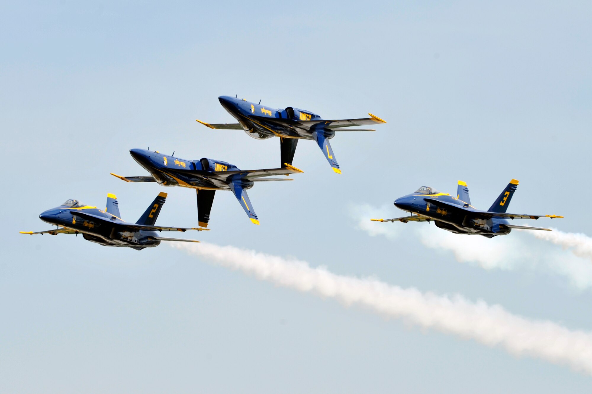 The United States Navy Blue Angels demonstration team performs during the Joint Service Open House, May 18, 2012, at Joint Base Andrews, Md. This year's Joint Service Open House celebrates the Centennial of Marine Corps Aviation. JSOH affords the public an opportunity to meet the men and women of the Armed Forces while viewing over 100 static displays and 19 aerial demonstration teams. (U.S. Air Force photo by Senior Airman Perry Aston)