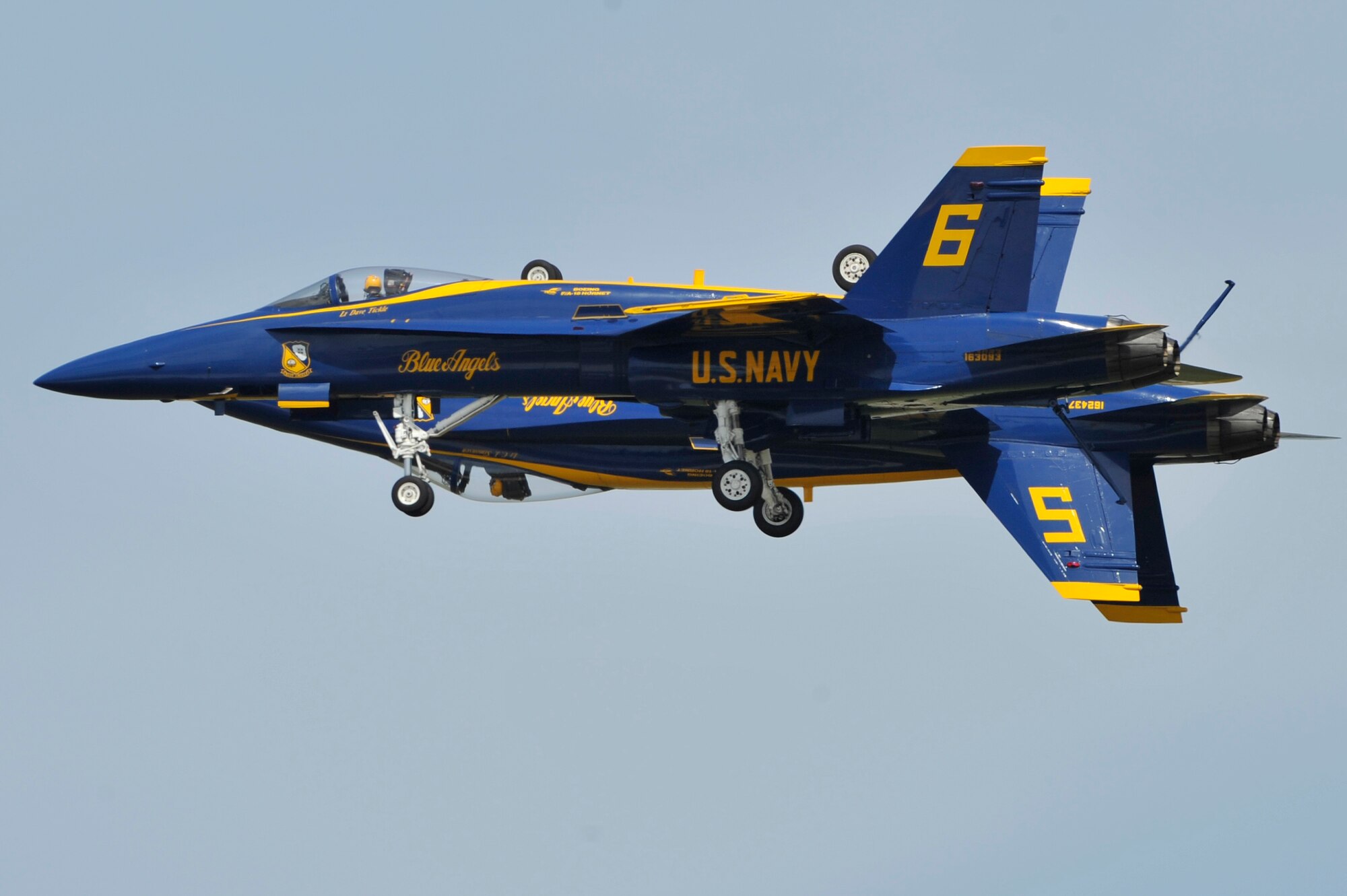 The United States Navy Blue Angels demonstration team performs during the Joint Service Open House, May 18, 2012, at Joint Base Andrews, Md. This year's Joint Service Open House celebrates the Centennial of Marine Corps Aviation. JSOH affords the public an opportunity to meet the men and women of the Armed Forces while viewing over 100 static displays and 19 aerial demonstration teams. (U.S. Air Force photo by Senior Airman Perry Aston)