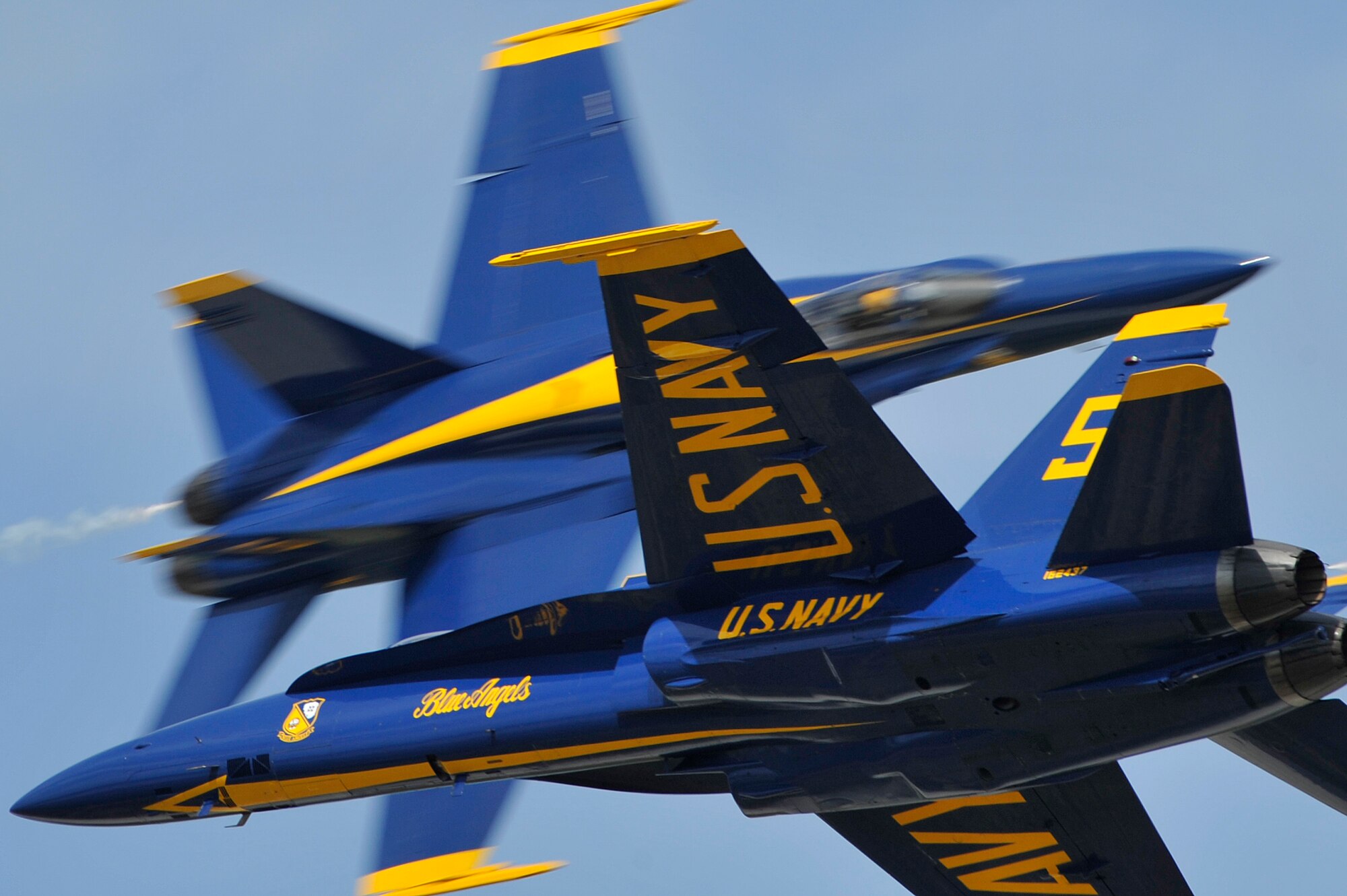 The United States Navy Blue Angels demonstration team performs during the Joint Service Open House, May 18, 2012, at Joint Base Andrews, Md. This year's Joint Service Open House celebrates the Centennial of Marine Corps Aviation. JSOH affords the public an opportunity to meet the men and women of the Armed Forces while viewing over 100 static displays and 19 aerial demonstration teams. (U.S. Air Force photo by Senior Airman Perry Aston)
