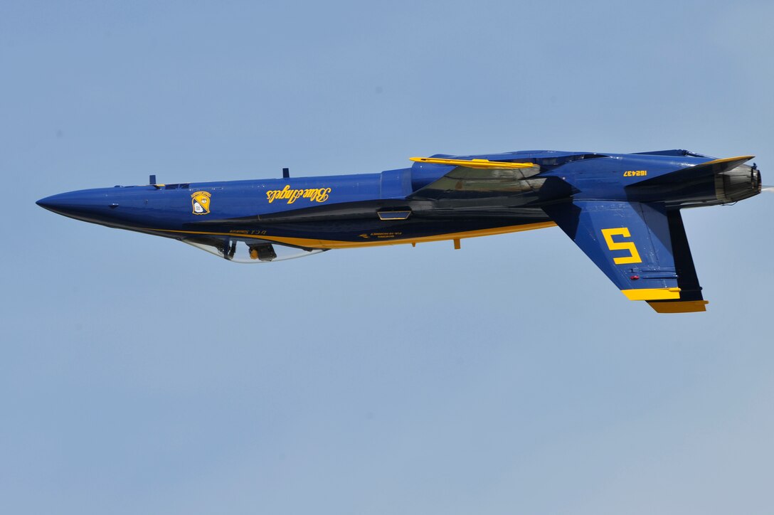The United States Navy Blue Angels demonstration team performs during the Joint Service Open House, May 18, 2012, at Joint Base Andrews, Md. This year's Joint Service Open House celebrates the Centennial of Marine Corps Aviation. JSOH affords the public an opportunity to meet the men and women of the Armed Forces while viewing over 100 static displays and 19 aerial demonstration teams. (U.S. Air Force photo by Senior Airman Perry Aston)