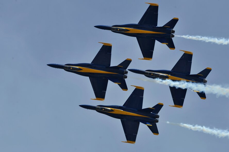 The United States Navy Blue Angels demonstration team performs during the Joint Service Open House, May 18, 2012, at Joint Base Andrews, Md. This year's Joint Service Open House celebrates the Centennial of Marine Corps Aviation. JSOH affords the public an opportunity to meet the men and women of the Armed Forces while viewing over 100 static displays and 19 aerial demonstration teams. (U.S. Air Force photo by Senior Airman Perry Aston) 
