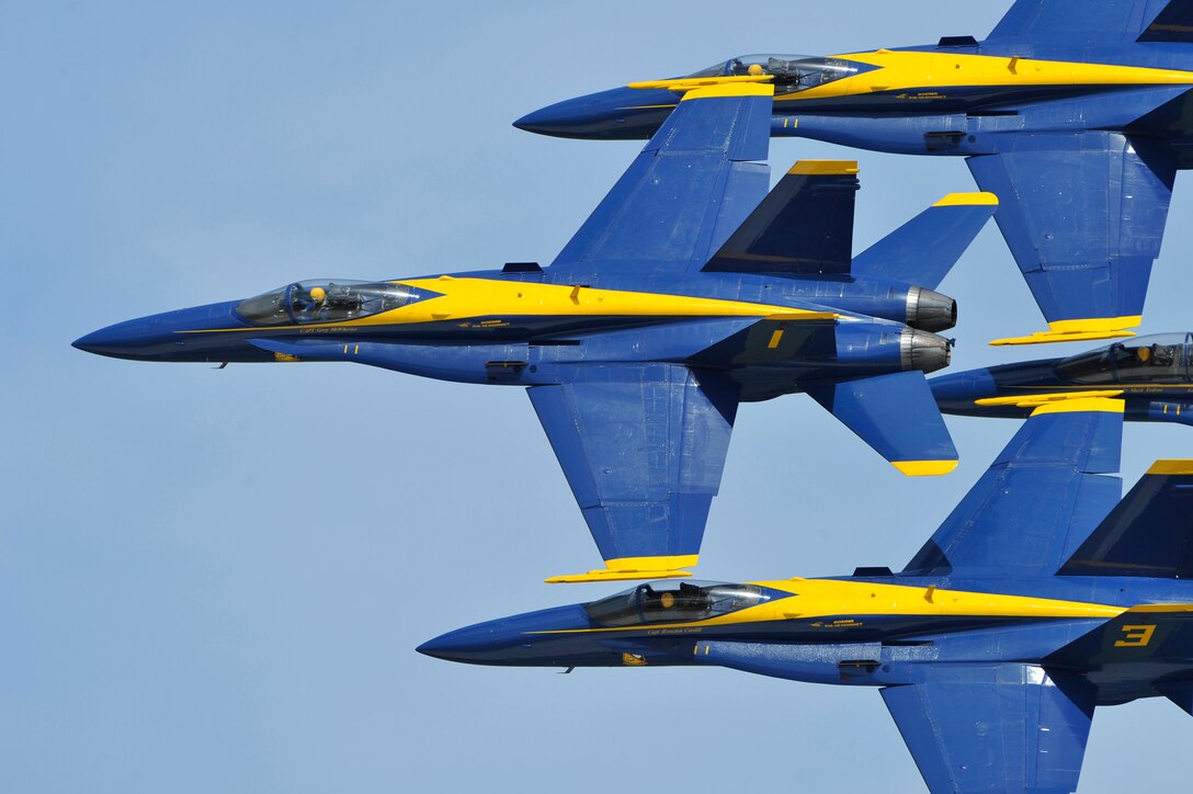 The United States Navy Blue Angels demonstration team performs during the Joint Service Open House, May 18, 2012, at Joint Base Andrews, Md. This year's Joint Service Open House celebrates the Centennial of Marine Corps Aviation. JSOH affords the public an opportunity to meet the men and women of the Armed Forces while viewing over 100 static displays and 19 aerial demonstration teams. (U.S. Air Force photo by Senior Airman Perry Aston)