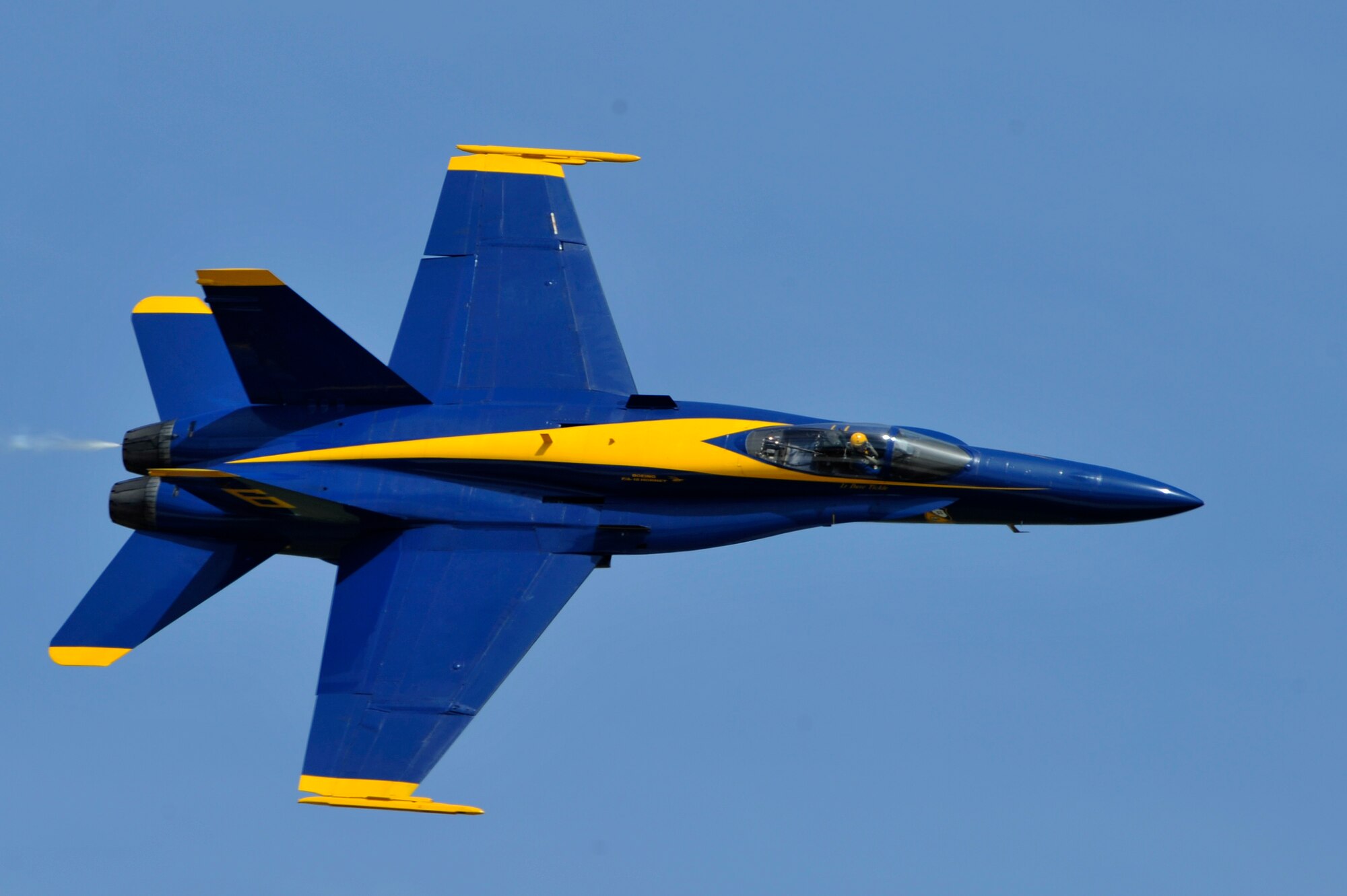 The United States Navy Blue Angels demonstration team performs during the Joint Service Open House, May 18, 2012, at Joint Base Andrews, Md. This year's Joint Service Open House celebrates the Centennial of Marine Corps Aviation. JSOH affords the public an opportunity to meet the men and women of the Armed Forces while viewing over 100 static displays and 19 aerial demonstration teams. (U.S. Air Force photo by Senior Airman Perry Aston)