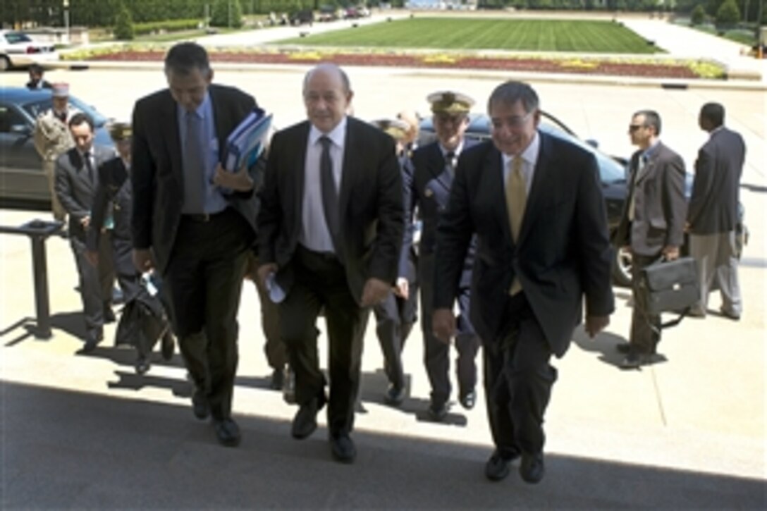 U.S. Defense Secretary Leon E. Panetta escorts French Minister of Defense Jean-Yves Le Drian into the Pentagon, May 19, 2012. Panetta and Le Drian met to discuss defense issues of mutual concern.