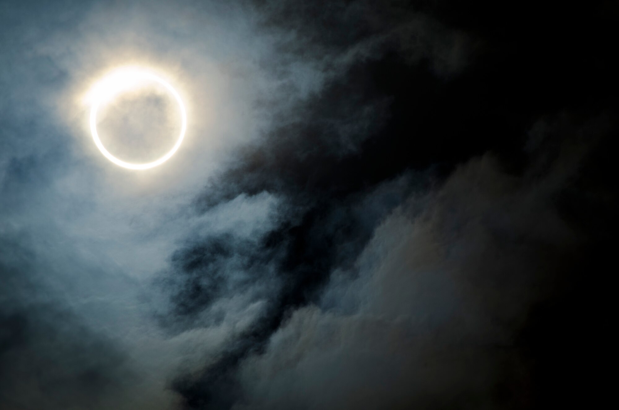 YOKOTA AIR BASE, Japan -- The moon covers the sun in an annular solar eclipse over Yokota Air Base, Japan, May 21, 2012. This event took place in Japan for the first time in 25 years, and Yokota was directly in the path to observe the moon centered over the sun. The eclipse is estimated to bolster the Japanese economy by 16.4 billion yen ($208 million) through eclipse-related merchandise and tourism, according to Kansai University economist Katsuhiro Miyamoto. (U.S. Air Force photo by Staff Sgt. Samuel Morse)