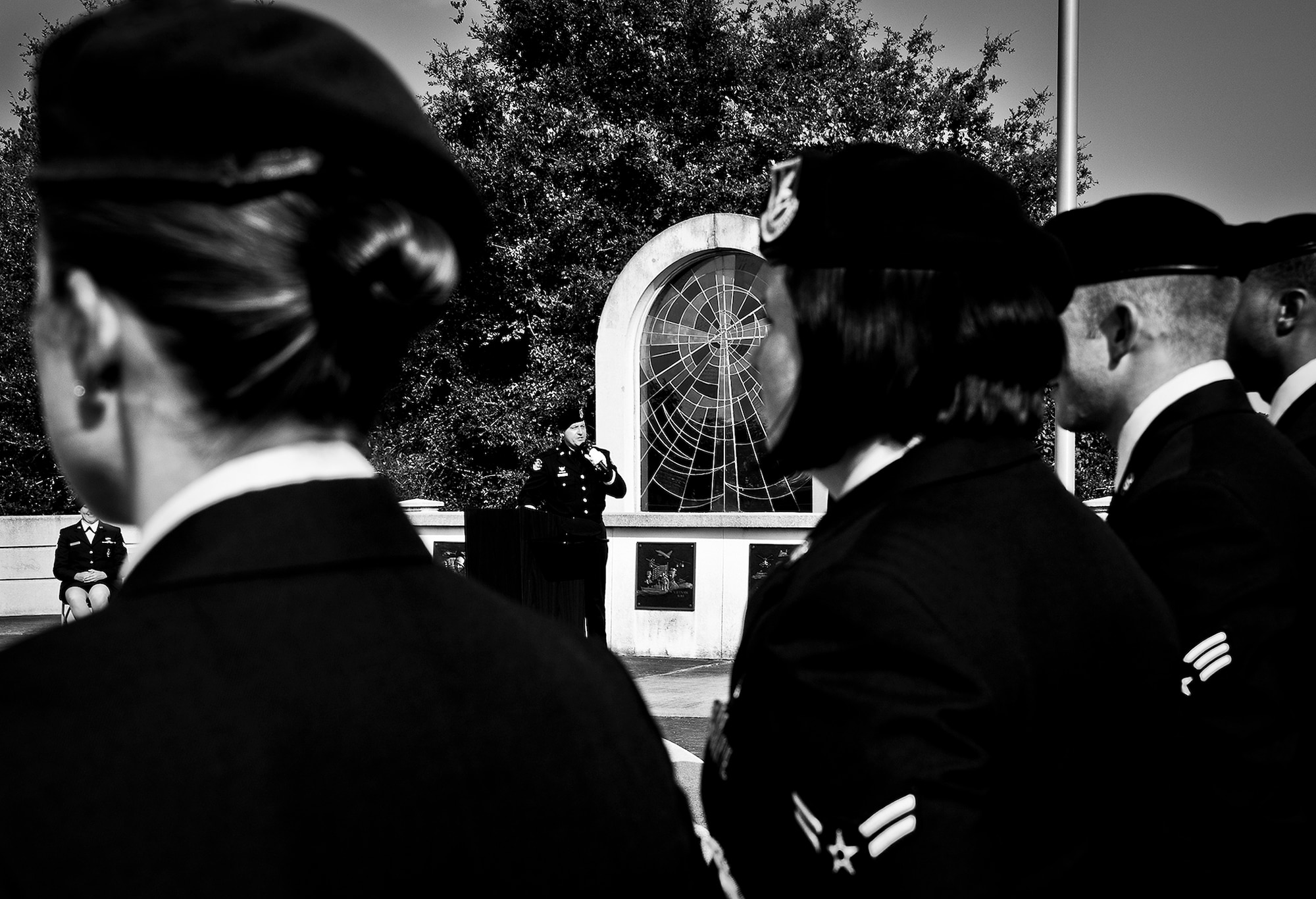 Chief of the Niceville Police Department, David Popwell, speaks to a formation of Airmen from the 96th Security Forces Squadron during a remembrance and retreat ceremony at the All Wars Memorial May 17 at Eglin Air Force Base, Fla.  The ceremony formally closed Police Week activities.  Popwell, a former security forces Airman, was the guest speaker at the event.  During his speech, he donned the Air Force security force’s black beret to honor his fellow Airmen still serving.  (U.S. Air Force photo/Samuel King Jr,)