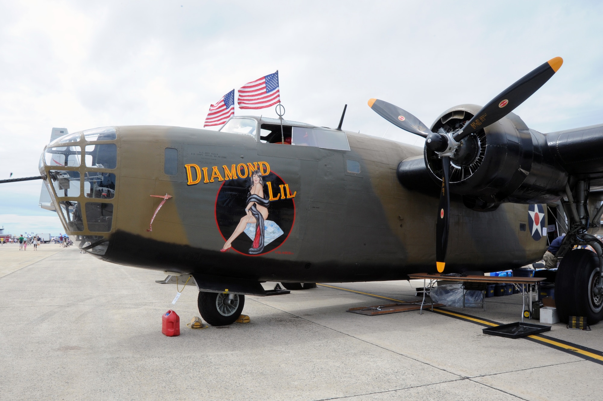 The close air support (CAS) B-24A Liberator on display at 2012 JSOH had guests stopping in their paths to snap photos of Diamond Lil – the brown hair, blue eye pin up girl that represents the aircrafts call sign. Walking around the 2012 Joint Service Open House on Joint Base Andrews, Md., May 18 – 20, guests get an eclectic view of military aviation. There is one thing that they many of them have in common – unique paint jobs that dress each of them individually. (U.S. Air Force photo by Airman 1st Class Tabitha N. Haynes)