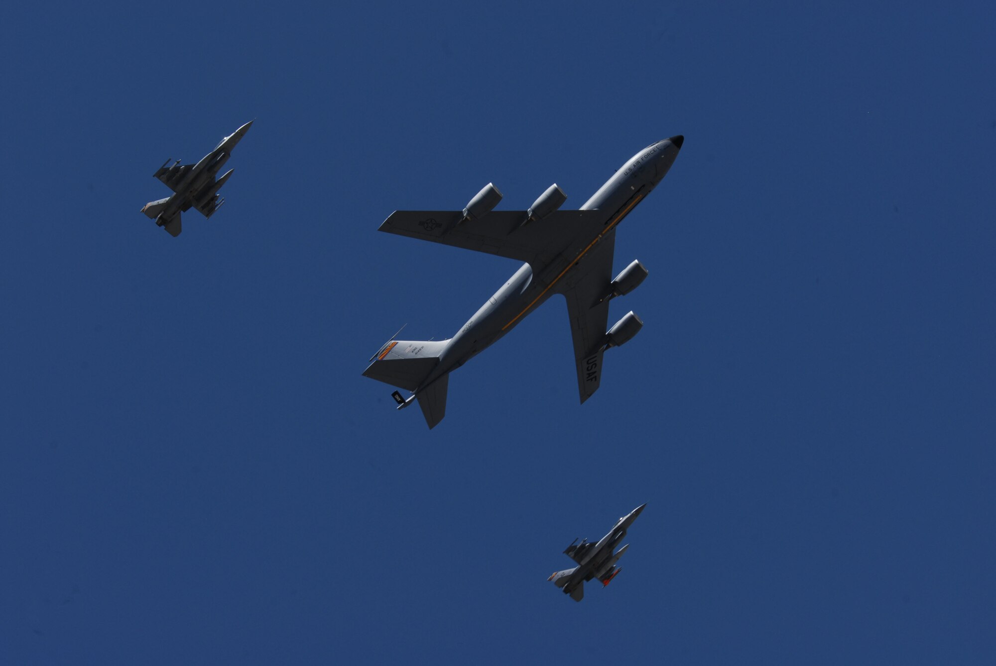 A 161st Air Refueling Wing KC-135R Stratotanker and F-16 Falcons from the 162nd Fighter Wing in Tucson fly over May 10, 2012, at the funeral services for retired Maj. Gen. Donald L. Owens. A native of Phoenix, General Owens joined the Arizona Air National Guard as a private in 1952 and served nearly 45 years. He received his Air Force pilot’s wings in 1953, along with his commission as an officer. In 1956, he became the chief of maintenance for the Phoenix Air National Guard Base at Sky Harbor International Airport, a position he held for the next 20 years. He was responsible for the maintenance of the aircraft of the 161st Air Refueling Group. In 1977, he became the chief of base activities for the Phoenix Air National Guard Base. A year later, he became commander of the 161st Air Refueling Group. From 1983 to 1985, he was the commanding general of the Arizona Air National Guard. In 1985, he became the Adjutant General and Director of the Arizona Department of Emergency and Military Affairs, a position he held until 1994. After his retirement from the Arizona Air National Guard, General Owens worked as a consultant for several defense contractors and as the Director of Military Programs for Robertson Aviation. General Owens was inducted into the Arizona Aviation Hall of Fame in 2010. Arizona Governor Jan Brewer said in a press release, “For his committed service to the State of Arizona and to the United States of America, we are eternally indebted to Maj. Gen. Owens. Please join me in offering a prayer for his family, friends and fellow servicemen and women, each of whom deserves our gratitude and respect.” (U.S. Air Force photo by Staff Sgt. Courtney Enos/Released)