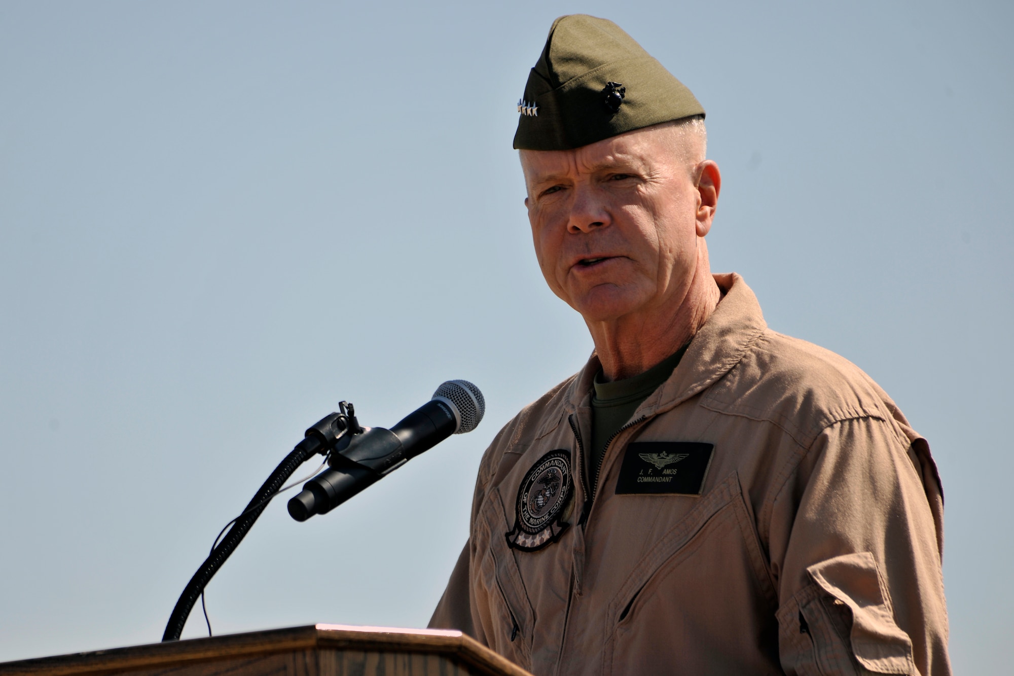 Commandant of the Marine Corps Gen. James F. Amos speaks during the opening ceremony of the 2012 Joint Service Open House, May 19 at Joint Base Andrews, Md. This year's Joint Service Open House celebrates the Centennial of Marine Corps Aviation. JSOH affords the public the opportunity to meet the men and women of the Armed Forces while viewing more than 100 static displays and 19 aerial demonstration teams.(U.S. Air Force photo by Senior Airman Perry Aston)