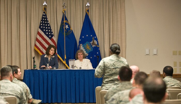 Nevada Attorney General Catherine Cortez Masto (left) and Holly Petraeus, an assistant director at the Consumer Financial Protection Bureau for Servicemember Affairs, respond to questions from Airmen at a Nellis Air Force Base, Nev., town hall May 16, 2012. The officials were on base to discuss the unique financial challenges servicemembers face and offer tips on how to avoid illegal or harmful financial practices. During the town hall, the pair discussed predatory lending practices, financial hardships and consumer protection options. Earlier, Masto and Petraeus dined with servicemembers and participated in a roundtable discussion with base senior leaders and representatives from support agencies.
