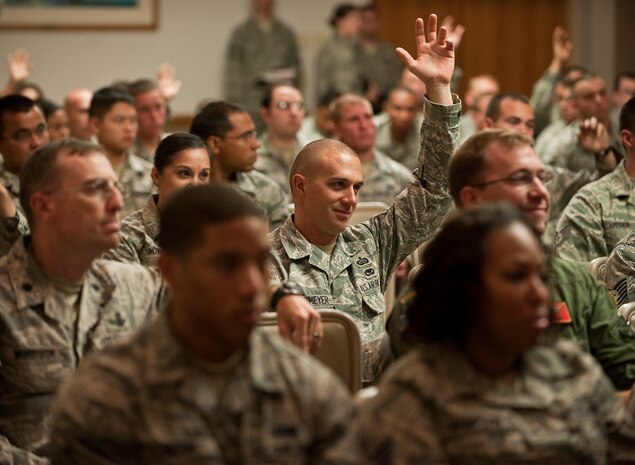 U.S. Air Force Airmen participate in a town hall meeting with Catherine Cortez Masto, State of Nevada Office of the Attorney General, and Holly Petraeus, Consumer Financial Protection Bureau,  May 16, 2012, at Nellis Air Force Base, Nev. Masto and Petraeus exchanged questions and information with Airmen about the financial challenges that Air Force members face. (U.S. Air Force photo by Staff Sgt. Christopher Hubenthal)