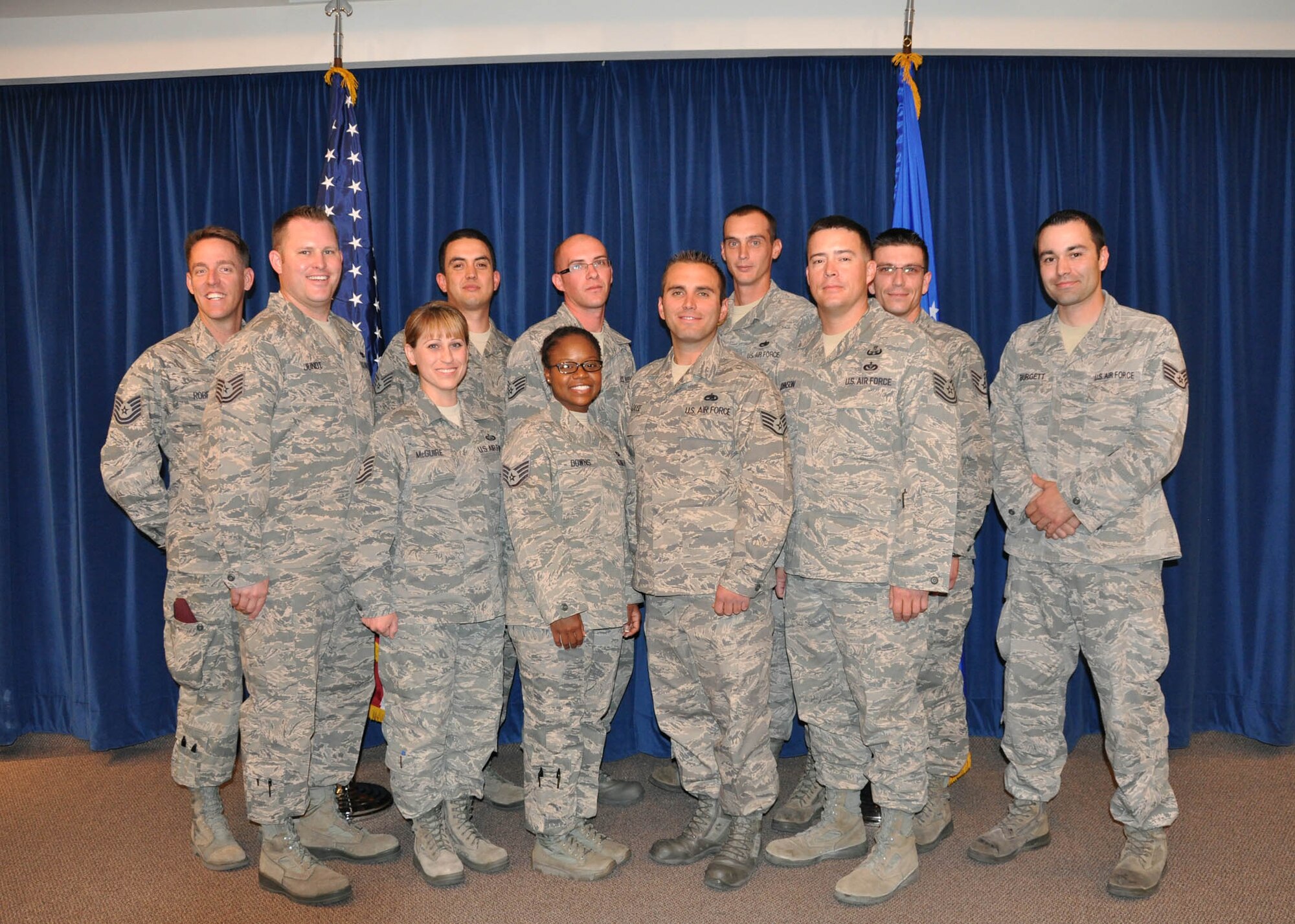NELLIS AIR FORCE BASE, Nev. -- The 926th Group celebrated 11 graduates of the Noncommissioned Officer Leadership Development Course during a ceremony here Apr. 27. (Back row left to right) Tech. Sgt. Robert Roberts, 58th Rescue Squadron, Tech. Sgt. Jonathan Jundt, 926th Aircraft Maintenance Squadron, Staff Sgt. Mason Allen, 926th Group, Staff Sgt. Christopher Simpson, 926th AMXS, Staff Sgt. Johnathan Jacobus, 926th AMXS, Staff Sgt. David Fox, 926th AMXS, Staff Sgt. Danny Burgett, 926th AMXS; (front row left to right) Tech. Sgt. Angela McGuire, 926th Force Support Squadron, Staff Sgt. Tynisa Downs, 926th FSS, Staff Sgt. Michael Loose, 926th AMXS, Tech. Sgt. Macord Johnson, 926th Civil Engineer Flight (U.S. Air Force photo/Maj. Jessica Martin)
