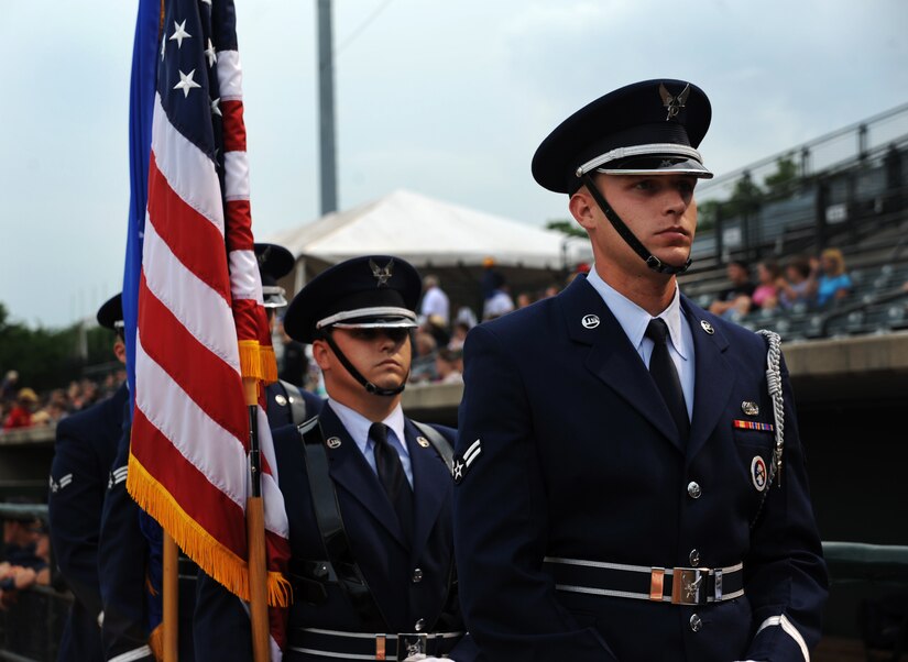 Joint Base Charleston Honor Guard prepares to post the colors at the Charleston RiverDogs Military Appreciation game May 17, 2012 at Charleston, S.C.  The Charleston RiverDogs hosted Military Appreciation night to show their support for the local military. (U.S. Air Force photo/Airman 1st Class Ashlee Galloway)