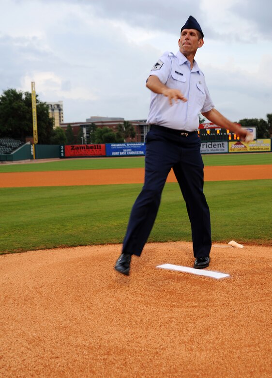 Chief Master Sgt. Damian Fox, 437th Operations Group superintendent, throws the first pitch during the Charleston RiverDogs Military Appreciation Night game May 17, 2012 at Charleston, S.C.  The Charleston RiverDogs hosted Military Appreciation night to show their support for the local military. (U.S. Air Force photo/Airman 1st Class Ashlee Galloway) 