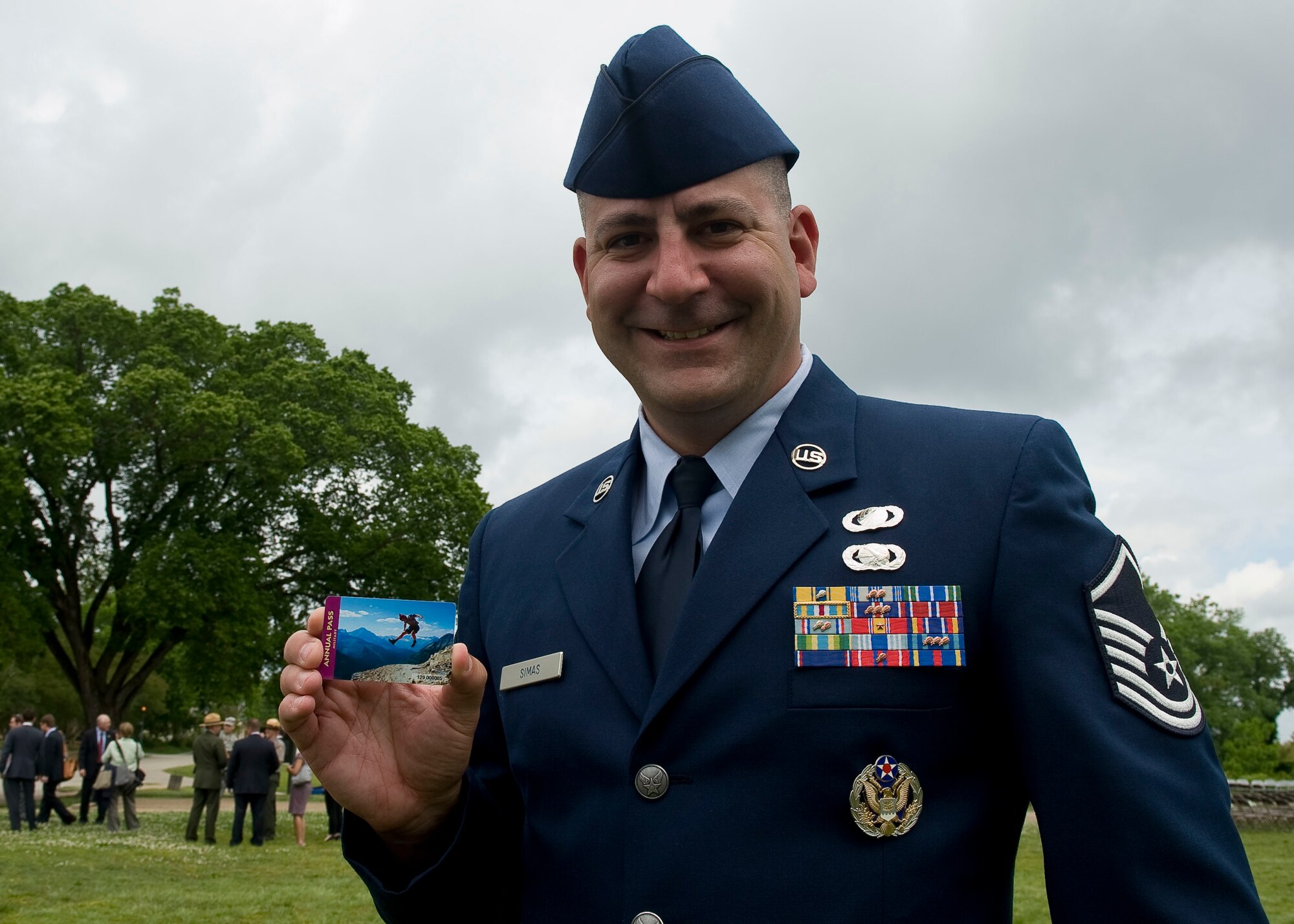 Master Sgt. Jason Simas, 633rd Contracting Squadron, displays his America the Beautiful National Parks and Federal Recreation Lands Annual Pass May 15, 2012, in Yorktown, Va. Simas was selected by his leadership to represent the Air Force, by receiving the pass, due to his outstanding service record and passion for the outdoors. (U.S. Air Force photo by Senior Airman John D. Strong II/Released)