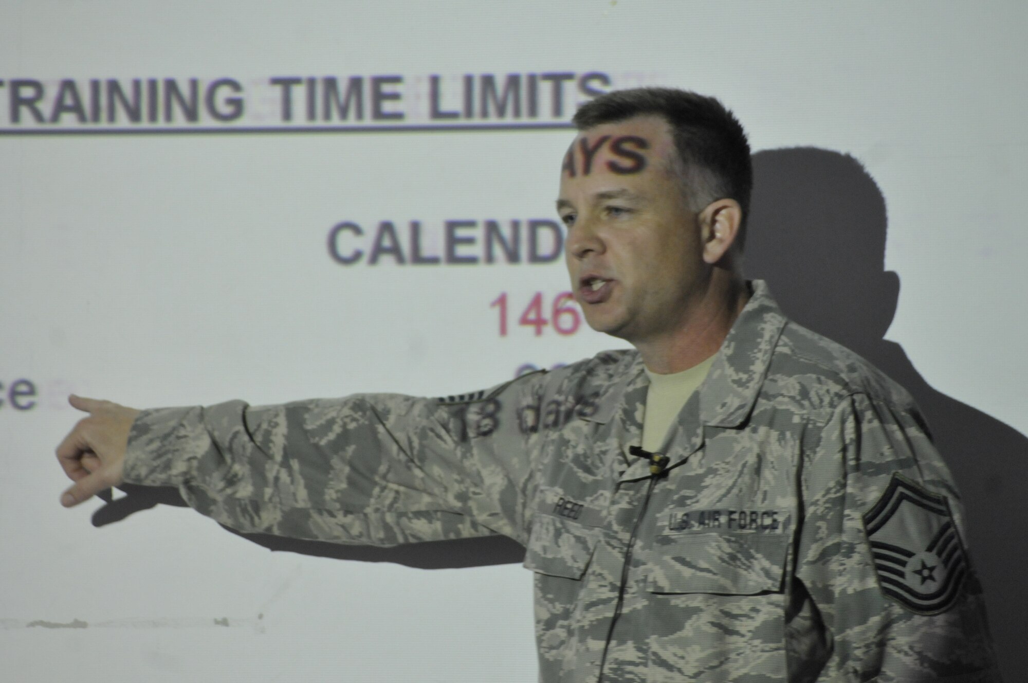 Senior Master Sgt. Richard Reed, 260th Air Traffic Control Squadron, briefs El Salvadoran Air Force air traffic controllers on how the Air National Guard trains their own air traffic controllers, as part of a week long Subject Matter Expert Exchange (SMEE) between the N.H. Air National Guard and the El Salvadoran Air Force, San Salvador, El Salvador, May 7 through 11, 2012.  This SMEE is part of the National Guard State Partnership Program. (Released/National Guard photo by Tech. Sgt. Aaron Vezeau)