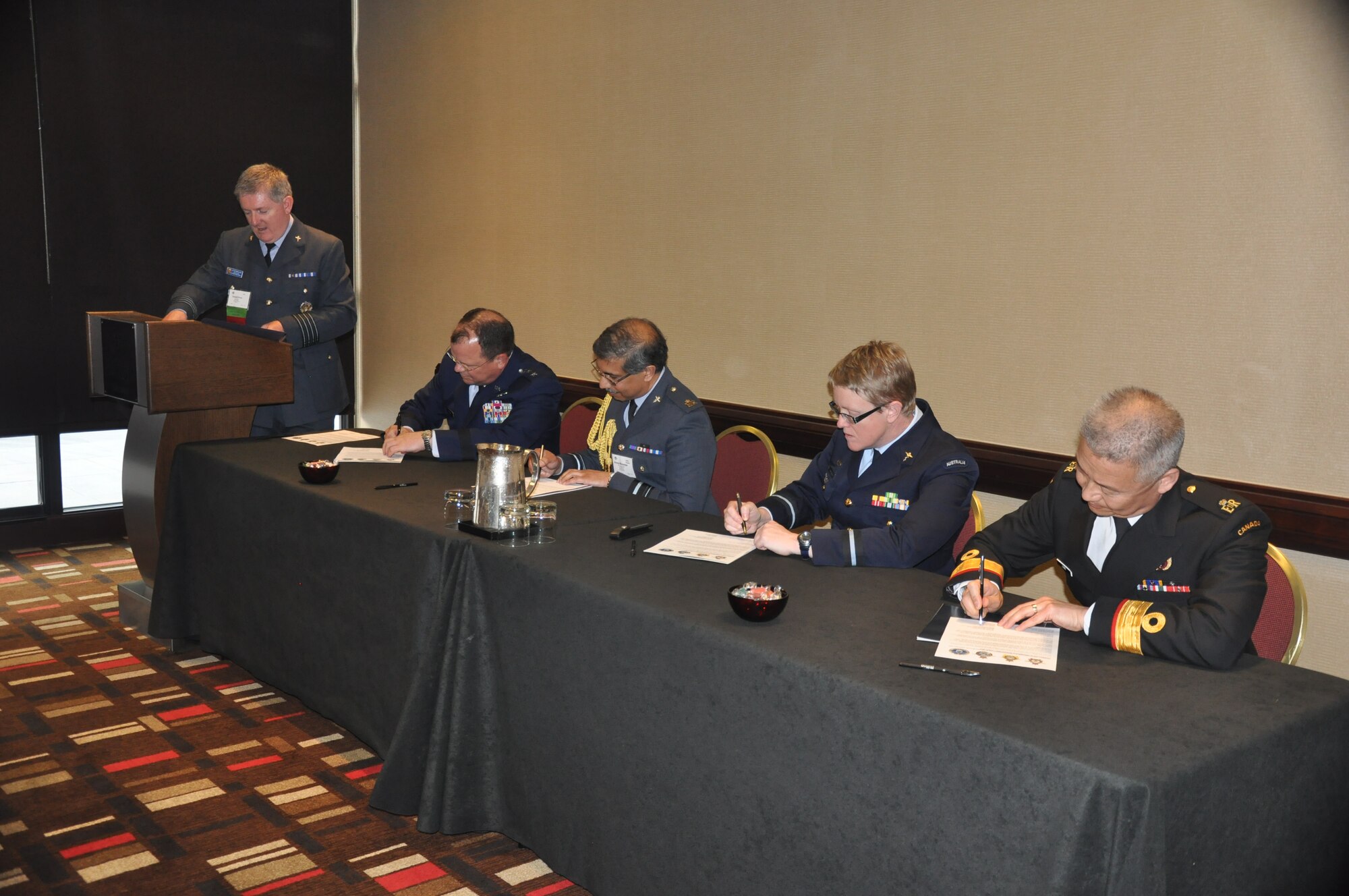 Lt. Gen. (Dr.) Charles B. Green, U.S. Air Force Surgeon General, along with the surgeons general of Australia, Canada and Great Britain, signed an international “Interfly” Proclamation of Understanding on May 14 during the Aerospace Medical Association Conference in Atlanta, Georgia.  (Photo by Pam Day)