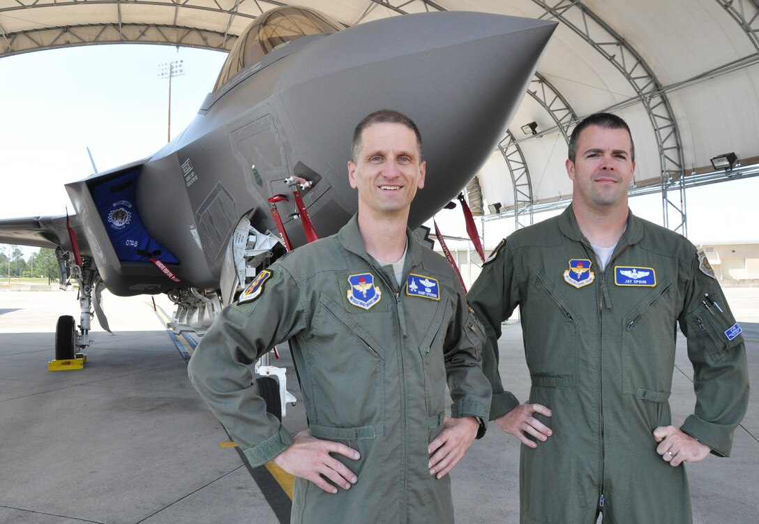Lt. Col. Randal Efferson (left) and Maj. Jay Spohn stand in front of the Air Force's newest fifth-generation fighter jet at Eglin Air Force Base, Fla., May 11, 2012. The Florida Air National Guardsmen are the only National Guard pilots currently assigned to the 33rd Operations Group and they’ll soon be taking to the skies to master the F-35 Lightning II Joint Strike Fighter. Photo by Master Sgt. Thomas Kielbasa
