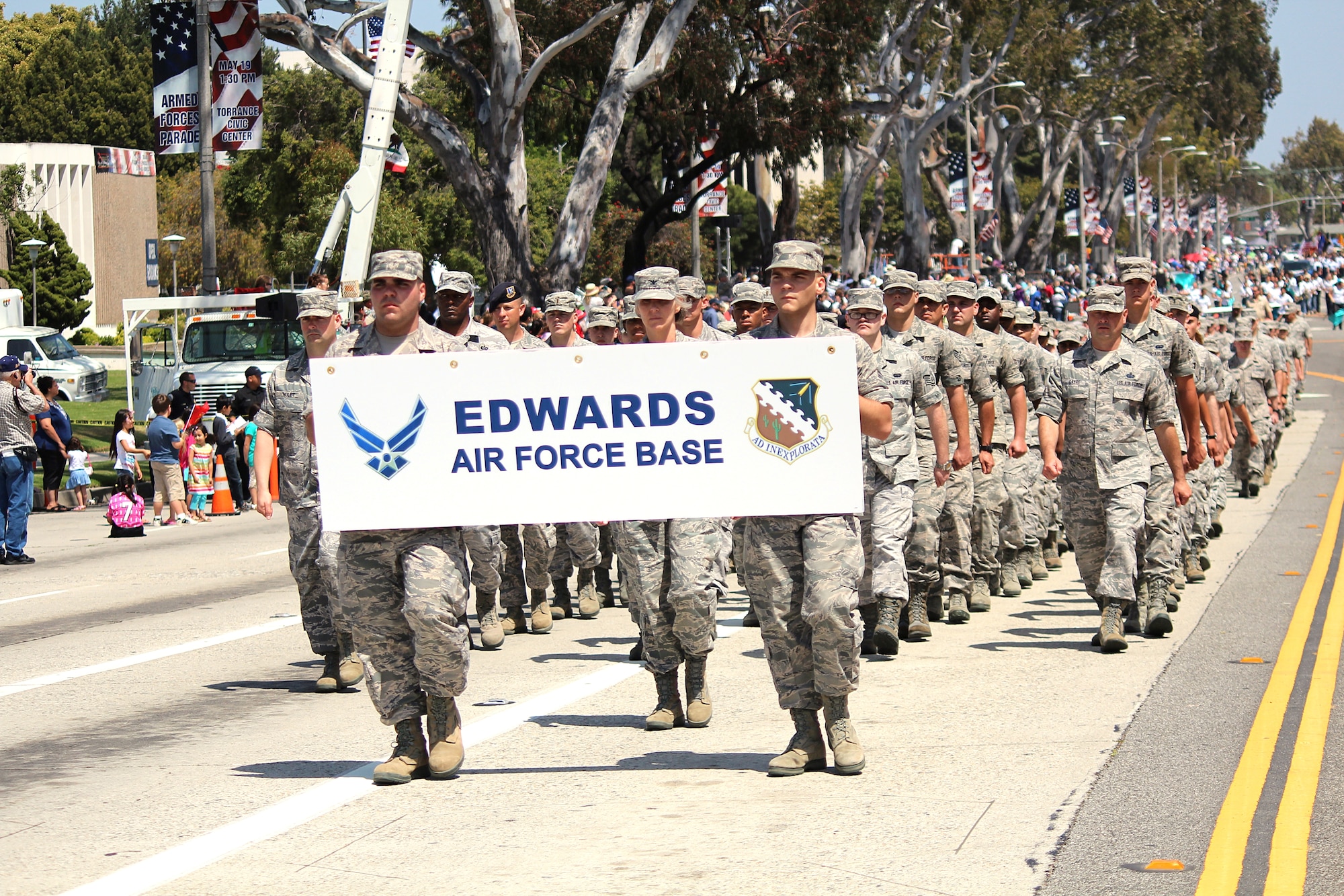 Team Edwards marches in front of a onlookers at the 53rd Annual Torrance Armed Forces Day Parade, May 19.  The parade featured all services including the U.S. Coast Guard.  The parade was the main event of Torrance's Annual Armed Forces Day Celebration, which goes from May 18 to 20.  (U.S. Air Force photo by Melissa Buchanan)