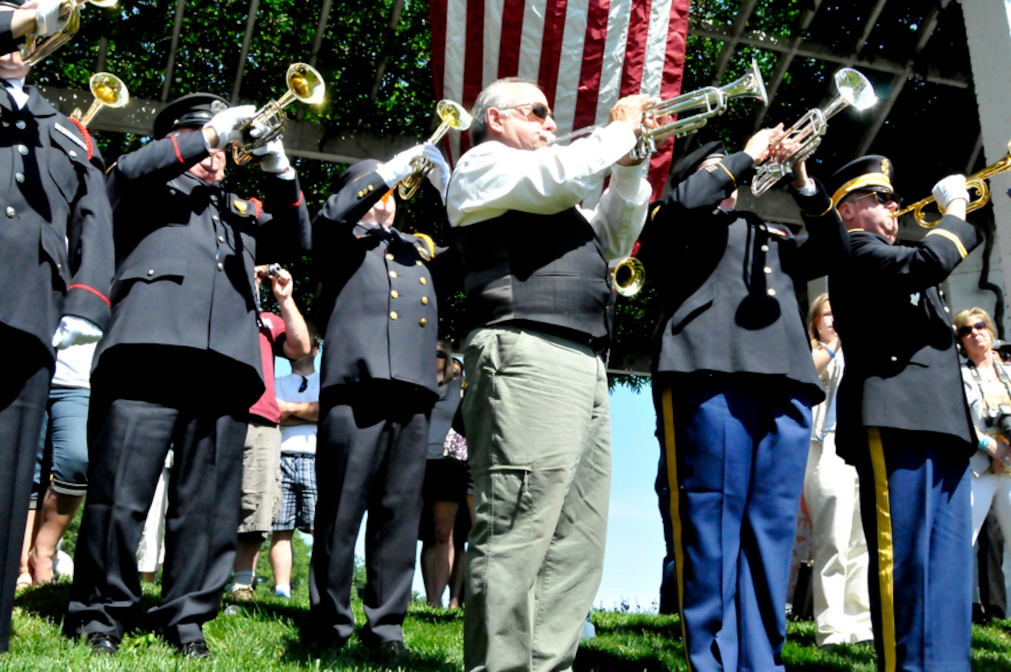 Buglers from across the nation gathered at Arlington National Cemetery on Saturday, May 19, 2012 to honor the 150th anniversary of taps. (Photo by Jim Dresbach)