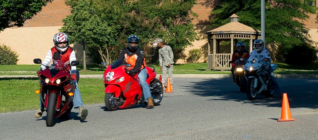 Motorcyclists arrive at the 2012 Joint Base Langley-Eustis Armed Forces Motorcycle Ride and Rodeo at Fort Eustis, Va., May 11, 2012. Before the event started, representatives from the 633rd Air Base Wing Safety Office and volunteers performed comprehensive safety inspections of all cycles and riders during registration. (U.S. Air Force photo by Senior Airman John D. Strong II/Released)