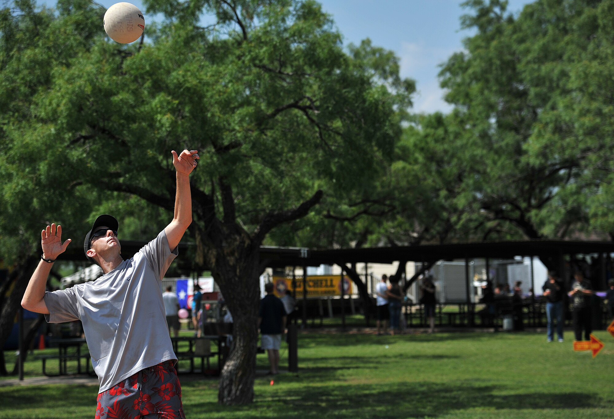 GOODFELLOW AIR FORCE BASE, Texas-- Lt. Col Keith Logeman, 17th Training Support Squadron Commander, serves the ball during a volleyball match during Goodfellow Appreciation Day held at the Recreational Camp May 19. The San Angelo community sponsored the 7th annual Goodfellow Appreciation Day and provided food, fun and activities to Team Goodfellow (U.S. Air Force photo/Airman 1st Class Michael Smith)