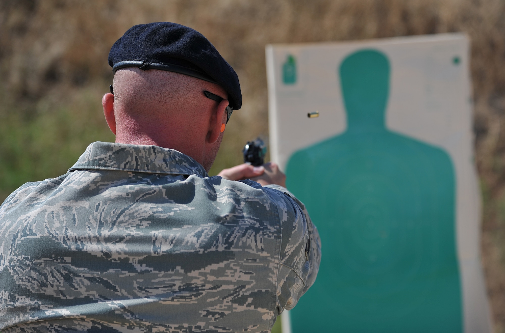 SAN ANGELO, Texas-- Staff Sgt. Christopher Kelley, 17th Security Forces Squadron, shoots at his target during National Police Week Firearm Competition at the San Angelo Police Department Gun Range May 18. Each team was given a set time limit to shot several shots at a variety of distances to test their capabilities. (U.S. Air Force photo/Airman 1st Class Michael Smith)