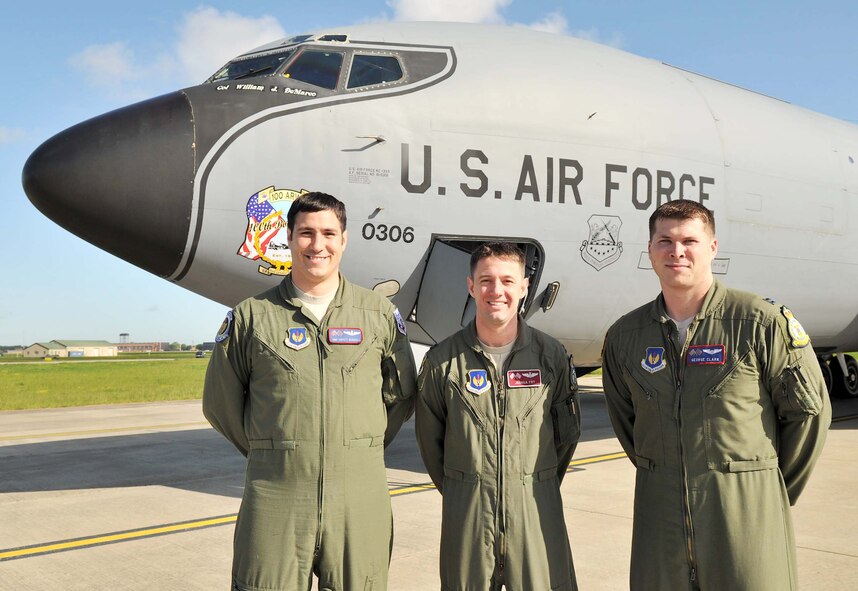 RAF MILDENHALL, England -- Staff Sgt. Everett Marshall, left, and Capt. Josh Fry, center, 351st Air Refueling Squadron, and Capt. George Clark, 100th Operations Support Squadron, were awarded the Brig. Gen. Ross G. Hoyt Award for their actions during Operations Odyssey Dawn and Unified Defense. (U.S. Air Force photo/Senior Airman Jerilyn Quintanilla)