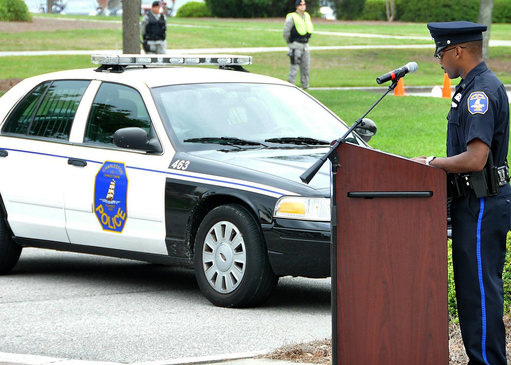 Tech. Sgt. Ulysius Vance, 315th Security Forces Squadron also an officer with the Charleston Police Department, reads names of South Carolina's fallen law enforcement officers during the Joint Base Charleston 2012 National Police Week memorial retreat ceremony at the base flagpole May 18, 2012 (U.S. Air Force photo / Michael Dukes)