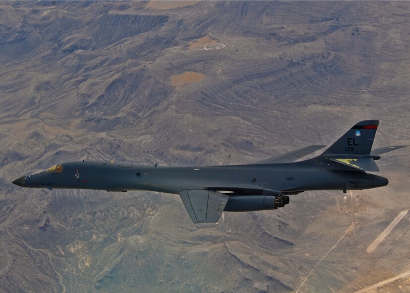 A B-1B Lancer from Ellsworth Air Force Base, S.D., flies over the Utah test range May 17 as part of Combat Hammer, a weapons system evaluation program. Aircraft from many different squadrons were on hand to participate in the air-to-ground evaluation conducted by the 86th Fighter Weapons Squadron, located at Eglin Air Force Base, Fla. The squadron hosts evaluations at Hill, Tyndall and Eglin each year, assessing weapon system performance, reliability, capabilities, and limitations in realistic combat scenarios against representative real-world targets. (Courtesy photo.)