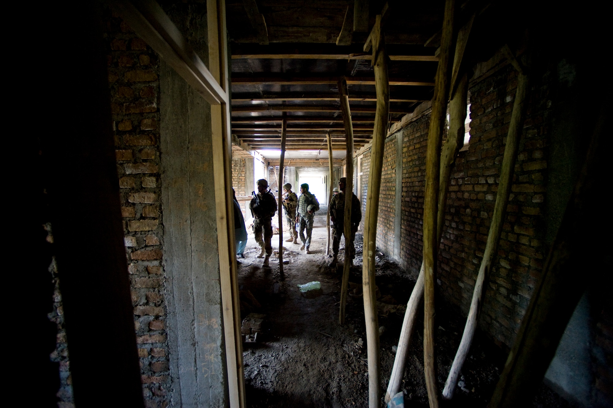 Members of Provincial Reconstruction Team Kapisa inspect a school with a local contractor, Kapisa Province, May 17, 2012. The Kapisa PRT is a U.S. military team that engages with local leaders and contractors to plan and inspect development projects in the province. (U.S. Air Force photo by Staff Sgt. Greg C. Biondo)(Released)