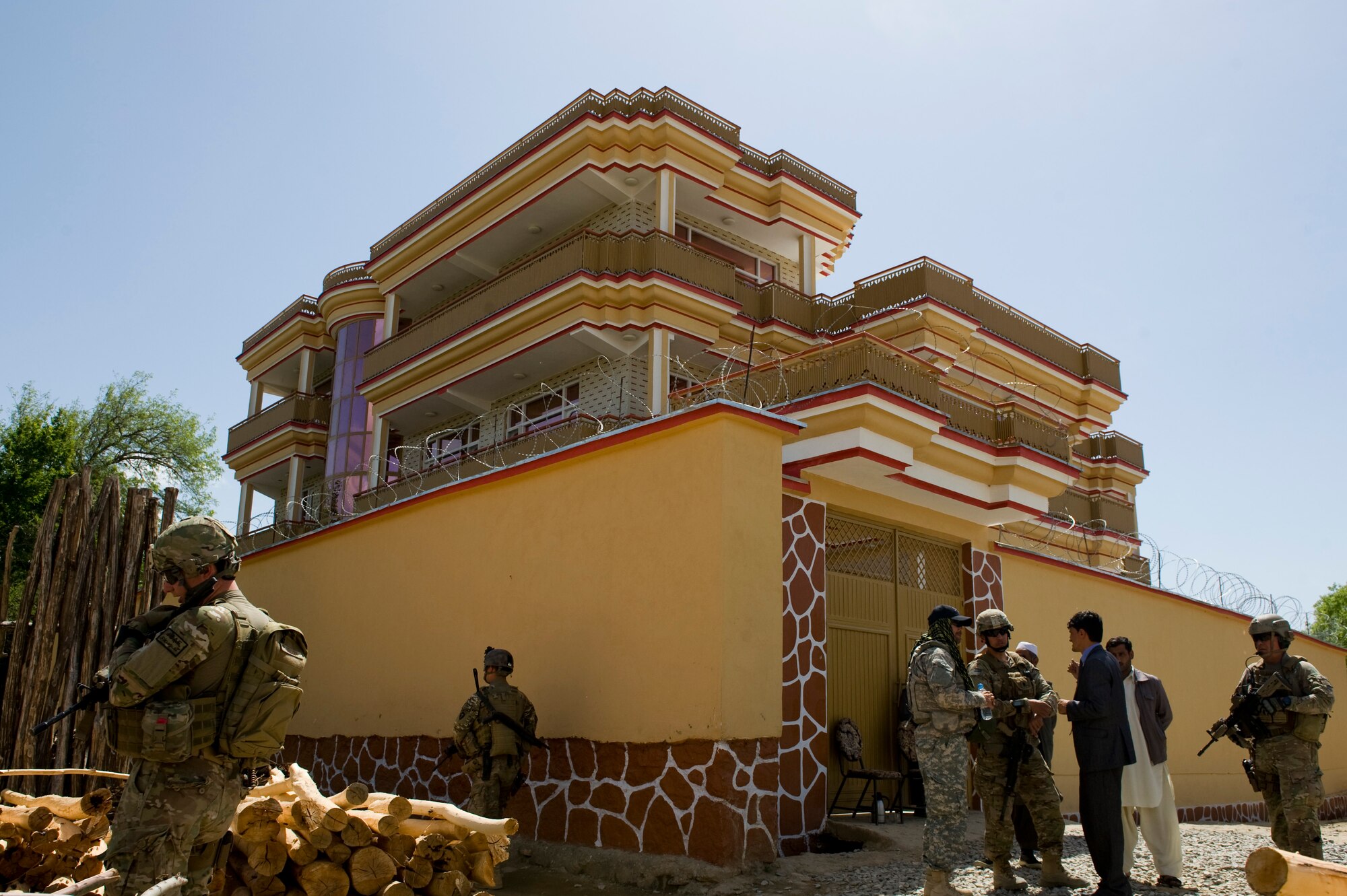 Members of Provincial Reconstruction Team Kapisa inspect a local midwifery after insurgents attacked the building with small arms fire and Rocket Propelled Grenades, Kapisa Province, Afghanistan, May 15, 2012. The Kapisa PRT is a U.S. military team that engages with local leaders and contractors to plan and inspect development projects in the province. (U.S. Air Force photo by Staff Sgt. Greg C. Biondo)(Released)