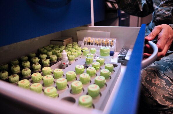 U.S. Air Force Senior Airman Justin Rhodes, 20th Dental Squadron dental lab technician, chooses a shade of porcelain to match a patient's teeth at Shaw Air Force Base, S.C., May 15, 2012. (U.S. Air Force photo by Airman Nicole Sikorski/Released) 