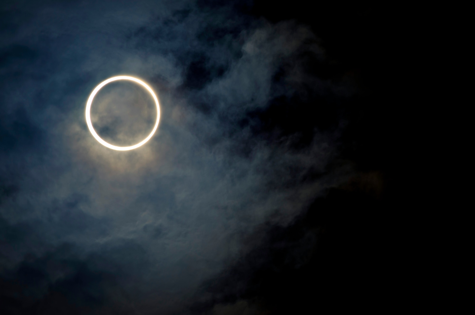 YOKOTA AIR BASE, Japan -- The moon covers the sun in an annular solar eclipse over Yokota Air Base, Japan, May 21, 2012. This event took place in Japan for the first time in 25 years, and Yokota was directly in the path to observe the moon centered over the sun. The eclipse is estimated to bolster the Japanese economy by 16.4 billion yen ($208 million) through eclipse-related merchandise and tourism, according to Kansai University economist Katsuhiro Miyamoto. (U.S. Air Force photo by Staff Sgt. Samuel Morse)