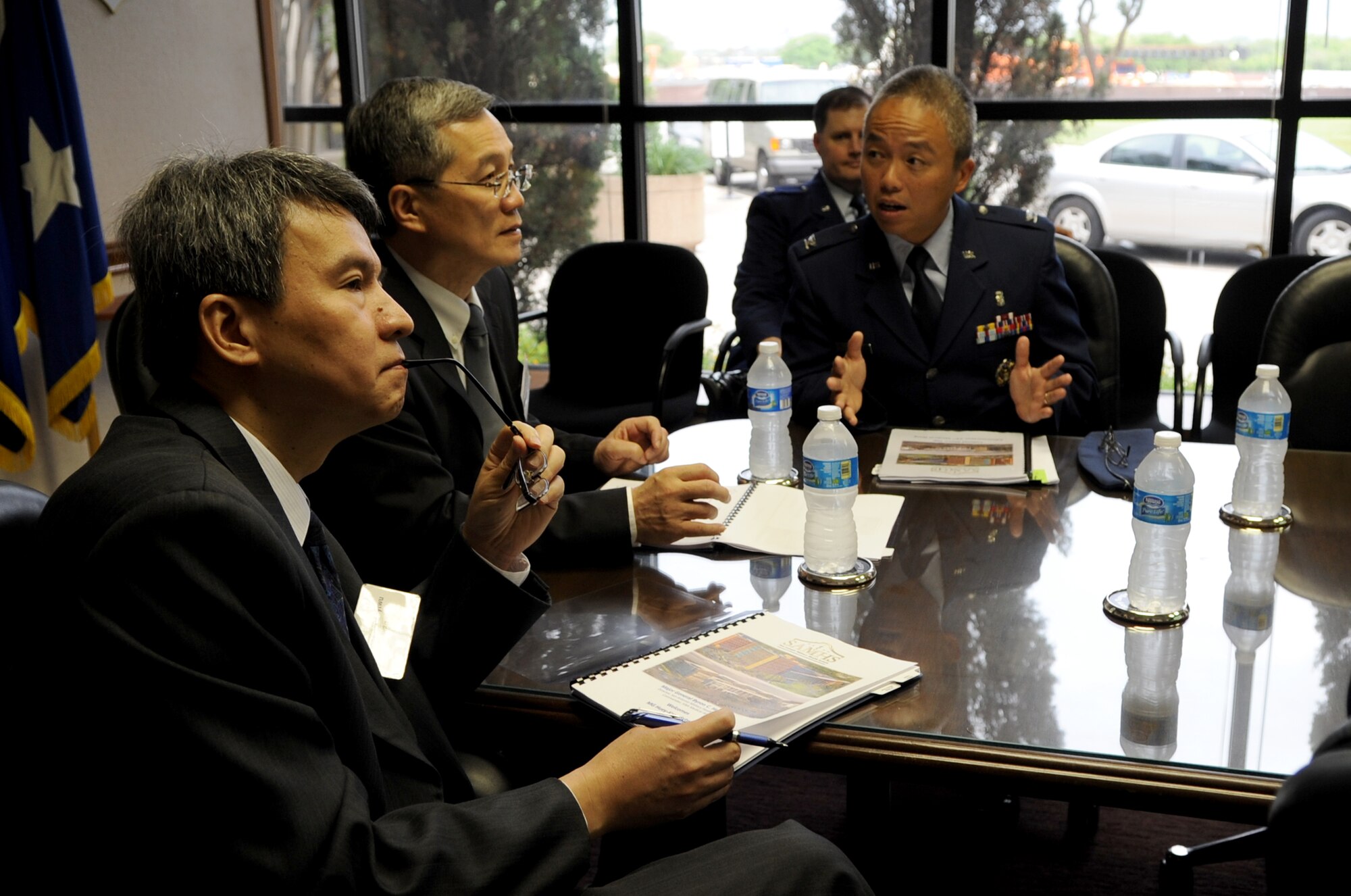 Maj. Gen. Huey-kwang Sytwu (left) and Lt. Gen. Deh-Ming Chang are briefed on the San Antonio Military Health System by U.S. Air Force Col. Glenn Yap at Wilford Hall Ambulatory Surgical Center at Lackland Air Force Base, San Antonio, Texas, May 15, 2012. Sytwu is director of the Medical Planning Division and Chang is Director General of the Medical Affairs Bureau of Taiwan and are visiting to learn about the SAMHS. Yap is the administrator for  the 59th Medical Wing. (U.S. Air Force Photo/Staff Sgt. Micky M. Bazaldua) 

