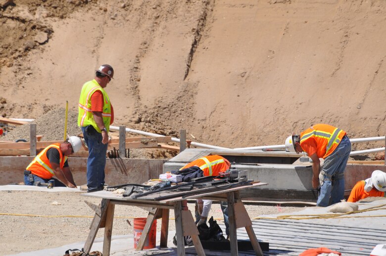 Corps contractors construct the second of two new 4-million-gallon water reservoirs May 11 at Vandenberg AFB, Calif. The new water tanks support a population of more than 18,000 military, family members, contractors and civilian employees at the base.